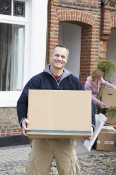 Man and van moving boxes during a home removal service