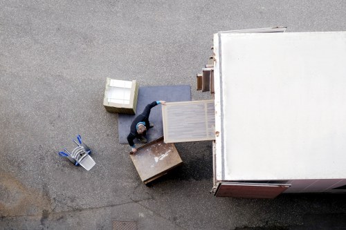 Man and van team loading recyclable household items for sorting