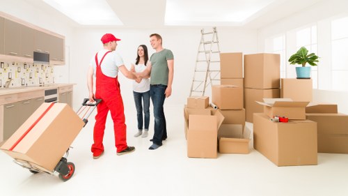Scheduled business move with labeled boxes and transport equipment