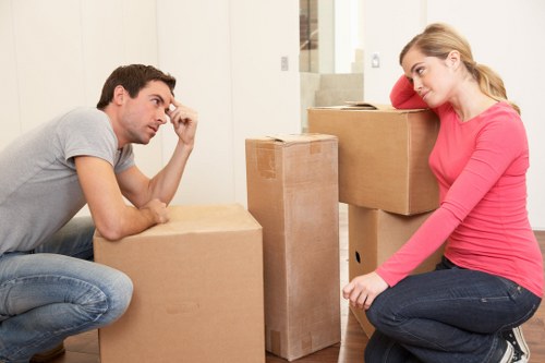Furniture and boxes being loaded into a moving truck