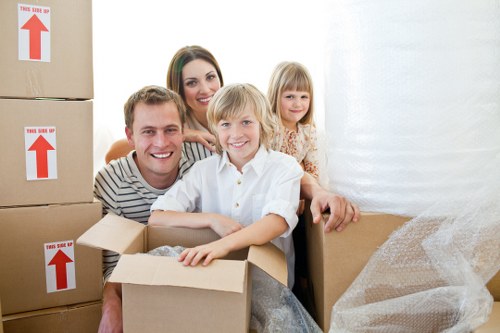Local movers loading a truck for a Queenspark move