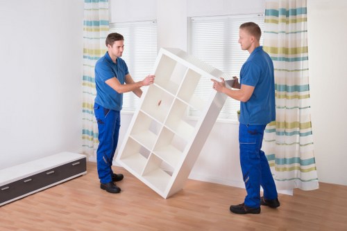 Man and van vehicle loading household items for delivery