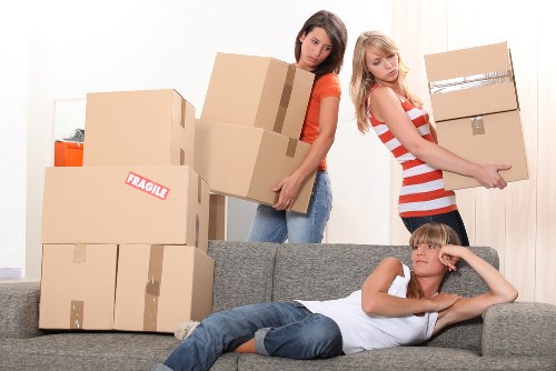 Queenspark apartment moving team preparing boxes and furniture for transport